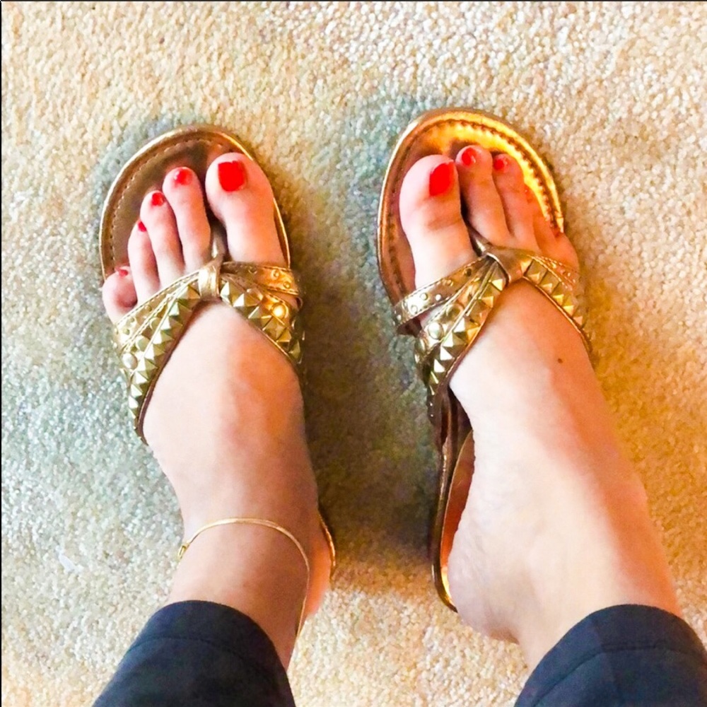 Bronze flip flops with studs . size 7